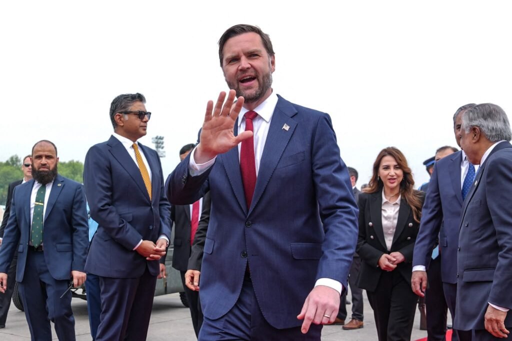 US Vice President JD Vance (C) gestures upon his arrival for the US-Iran peace talks in Islamabad on April 11, 2026. US Vice President JD Vance arrived in Islamabad on April 11 for talks with Iran that the Pakistani premier hosting the warring sides called a "make or break" effort to permanently halt weeks of fighting in the Middle East. (Photo by Jacquelyn MARTIN / POOL / AFP)